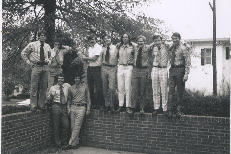 1967 -- New Members on brick wall in front of SigEp House
