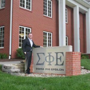 2015 Christian Sipe in front of SigEp sign