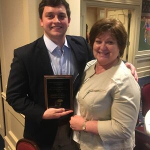 2017 Mitch Belller 2017 KU Fraternity Outstanding Senior Award with Housemother Sally Company